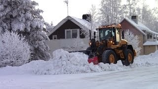 Volvo L70G  Cleaning snow of sidewalks [upl. by Aseuqram]