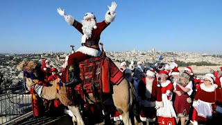 Touristen feiern orthodoxes Weihnachtsfest in Israel  AFP [upl. by Valoniah]