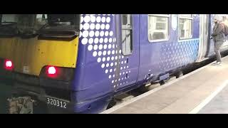 British Rail Class 318320 318263320312 arriving at Glasgow Central [upl. by Nimesay]