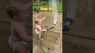 Baby playing with the hose funny baby cute shorts [upl. by Vanessa540]