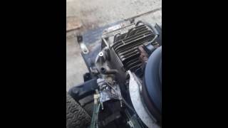 How to adjust carburetor on riding lawn mower [upl. by Ahsayn]