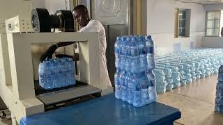 Bottled water production machine producing portable bottled water at the manufacturing factory [upl. by Wyn]