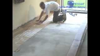 Installing Solid Oak Floor onto concrete with Rewmar MS Polymer Flexible Adhesive [upl. by Magas]