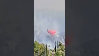 A plane drops retardant on The Garden Fire 110824 [upl. by Readus]