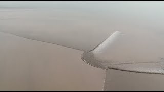 WorldFamous Qiantang Tidal Bore Roars in East China [upl. by Clarabelle669]