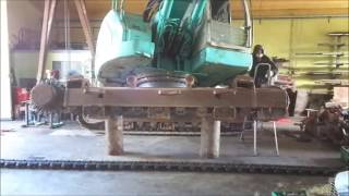 Undercarriage service with new Vematrack chains for Kobelco SK235 excavator [upl. by Neillij55]