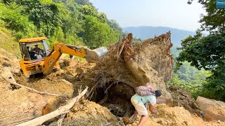 Epic StruggleJCB Backhoe vs Massive Sal Tree Root on Mountain Road [upl. by Dickerson843]