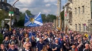 BIG Numbers of Scotland Fans March Through Cologne To Face Switzerland  Tartan Army [upl. by Ardnaskela877]