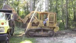 INTERNATIONAL 175B Track Loader loading stumps [upl. by Assilam]