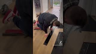 Fitting laminate flooring in a hallway laminateflooring viral homedecor [upl. by Abas]