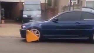 BMW with parking boot refuses to stop for anyone [upl. by Thaddus391]