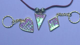 Zodiac pendants with UV resin open backed bezels and iridescent shred [upl. by Prentiss171]