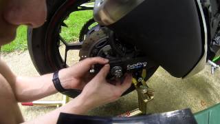 How to adjust motorcycle chain on Ninja 300 Ninja 400 [upl. by Yllut]