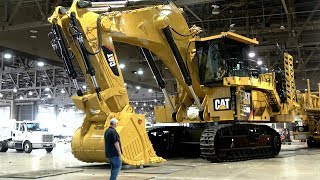 254 Ton Caterpillar 6020B excavator moving out of Minexpo 2016 [upl. by Norrat]