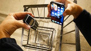 Dropping an iPhone 13 Pro vs Nokia 3310 Down Spiral Staircase 20 Stories  Will it Survive [upl. by Ssirk]