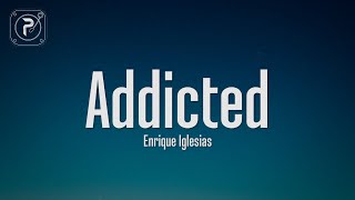 Enrique Iglesias  Addicted Lyrics [upl. by Enneiviv]