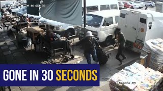 WATCH  Shoppers duck for cover as armed men rob cashintransit van in Marabastad [upl. by Elleirb511]