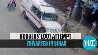 Caught on cam Robbers try to loot cash van in Bihar alert guards thwart attempt [upl. by Ornas266]