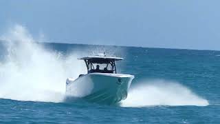 CRAZY POWER BOATS  GO FAST BOATS SPEEDINGAT HAULOVER INLET AND POLICE BOATS hauloverinlet [upl. by Oinimreh202]