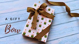 How to tie diagonal Ribbon Bow on Gift Box  Christmas Ribbon Gift wrap easy giftwrap [upl. by Baudin]