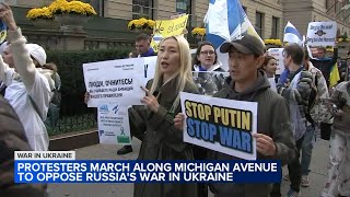 Protesters march in Chicago to oppose Russian President Putins war in Ukraine in global effort [upl. by Ttenaej119]