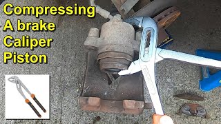 Compressing a Brake Caliper Piston Without any Special Tools [upl. by Rask949]