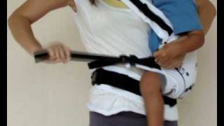 Manduca Baby Carrier Instructions  Switching from Cross Strap Front Carry to Hip Carry [upl. by Ilyak]