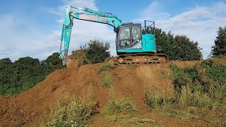 3000 tons of topsoiling and reviewing a Kobelco SK140 2019 Excavator [upl. by Misty]