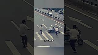 Man Risks Life to Stop ThreeWheeler and Save Child [upl. by Adev]