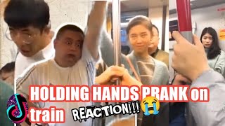 HOLDING HANDS PRANK ON TRAIN reactionITS ALL COMING BACK TO ME NOW [upl. by Etram]