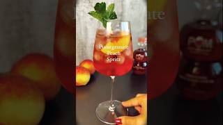 Pomegranate Peach Spitz Cheersspritz aperolspritz peach pomegranate bubbly cocktails drinks [upl. by Arinaid472]