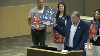 Conservative Christian cellphone company donates ‘In God We Trust’ signs to Carroll ISD [upl. by Nada922]