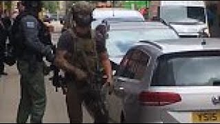 Armed police and soldiers raid Manchester city centre flat after Arena attack [upl. by Ulund515]