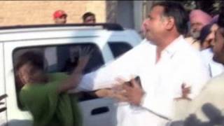 Akali Dal sarpanch slaps teacher in public [upl. by Essex]