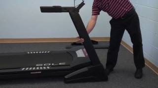 Sole Folding Treadmill Assembly Step 2 [upl. by Airetnahs42]