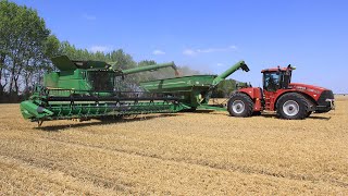 Harvest time in Germany with Case IH Steiger 450 HD  JampM 1326 grain cart and John Deere combines [upl. by May]