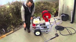 Honda 21 litre Interpump ws 202 pressure washer and hose reel [upl. by Atinahs]