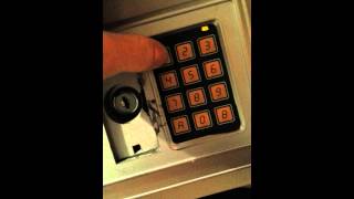 How to reset code on an electronic safe [upl. by Dnomaj]