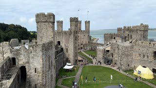 Wales Caernarfon Castle is a medieval FORTRESS World Tour Day 43 [upl. by Irrehc387]