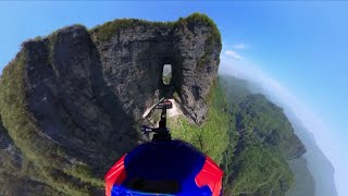 Chinese wingsuiter successfully flies through Tianmen Cave for first time [upl. by Chiaki]