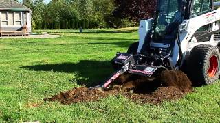 Bradco Trencher Attachment for Skid Steer Loaders  Overview and Demo [upl. by Rheta]