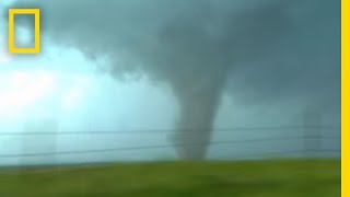 Tornadoes Lightning in Rare Video  National Geographic [upl. by Sibeal314]