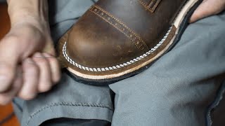 The process of making handmade work boots Hands of craftsmen who make handmade shoes all their live [upl. by Asirap]