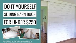 DIY Sliding Barn Door for Under 250 [upl. by Bergen]