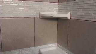 DIY shower tiling Installing floating corner shelves [upl. by Annahgiel124]