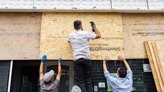 Bristol Birmingham and London businesses boarded up ahead of far right protests  SWNS [upl. by Yasibit]