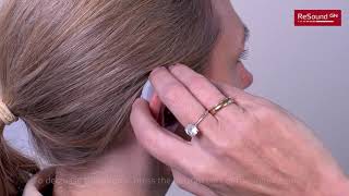 Adjust the volume for your BTE BehindtheEar hearing aid [upl. by Fabozzi]