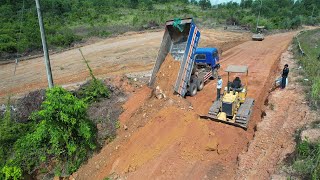 Road Widening Construction Filling Land Up In Dutch Bulldozer Excavator Dump Truck Operator [upl. by Theall629]