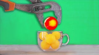 EXPERIMENT Glowing 1000 Degree METAL BALL VS PING PONG BALLS [upl. by Kellda]