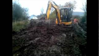 JCB Mini Digger Backfilling Trench Part 1 [upl. by Acimad940]